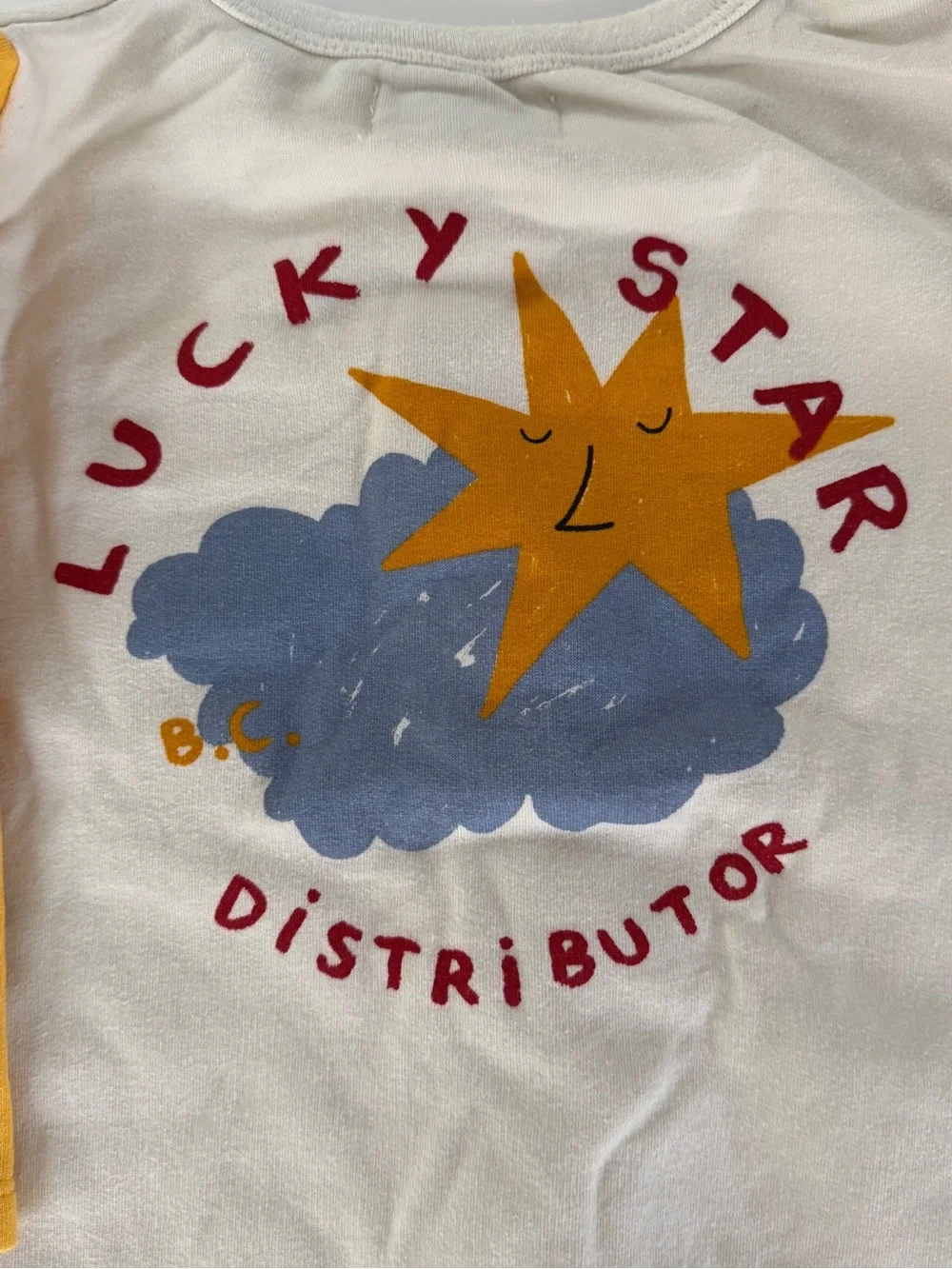 Bobo Choses Cream Footie with Yellow Sleeves and Chest Patch